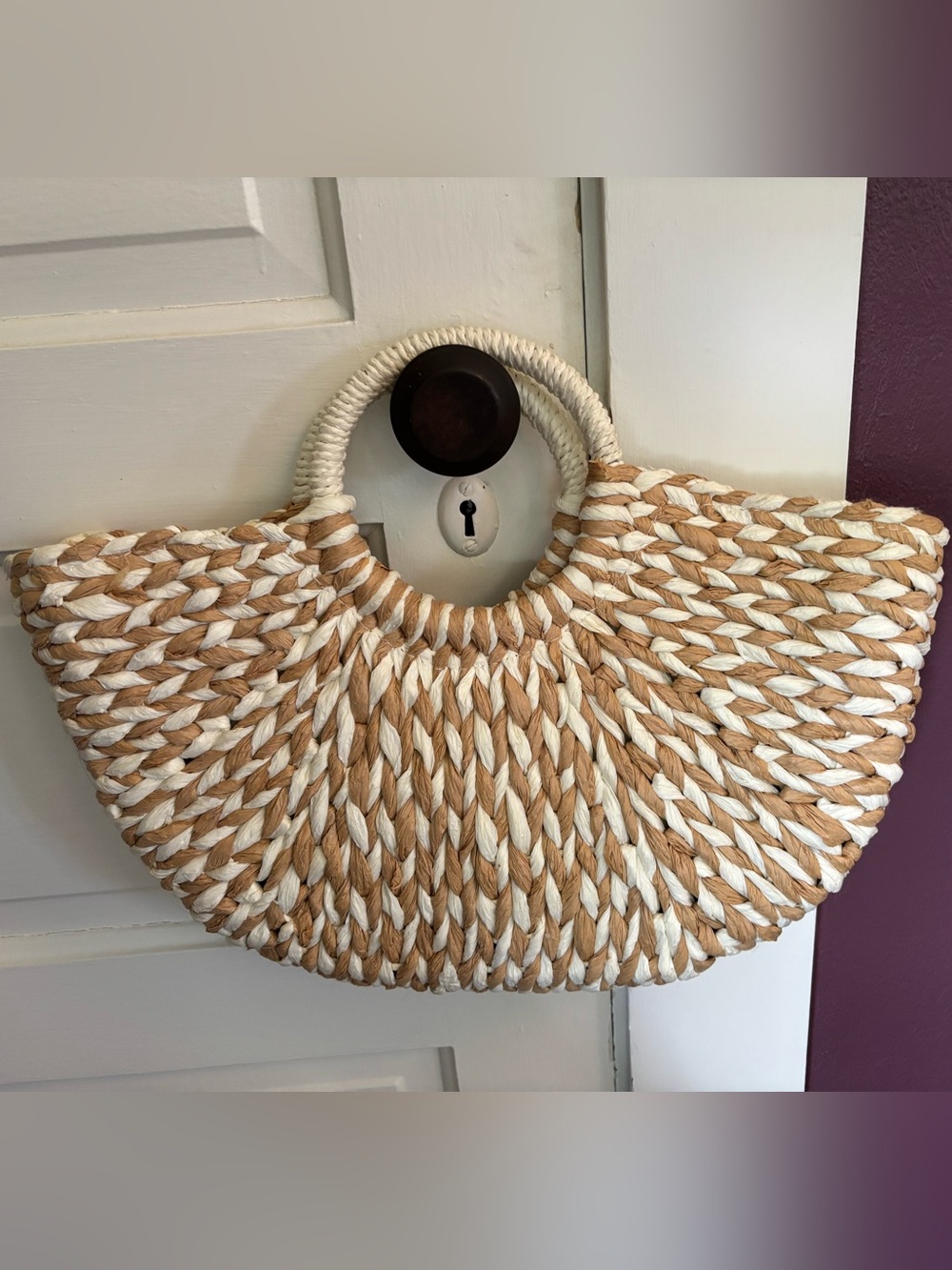 Rafia woven beach tote. NWOT. Drawstring lining to close.